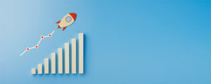 Rocket and chart on blue background business financial start up